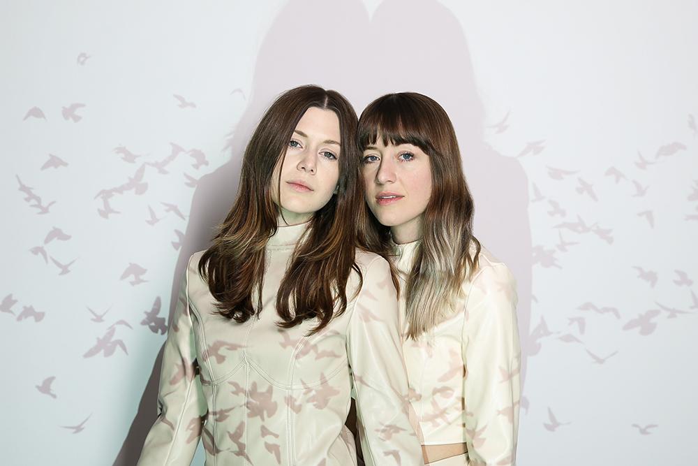 Larkin Poe & Hybrid Orchestra Nu Deco Ensemble Release “Mad As A Hatter” & Album Paint The Roses: Live In Concert Is Out Now